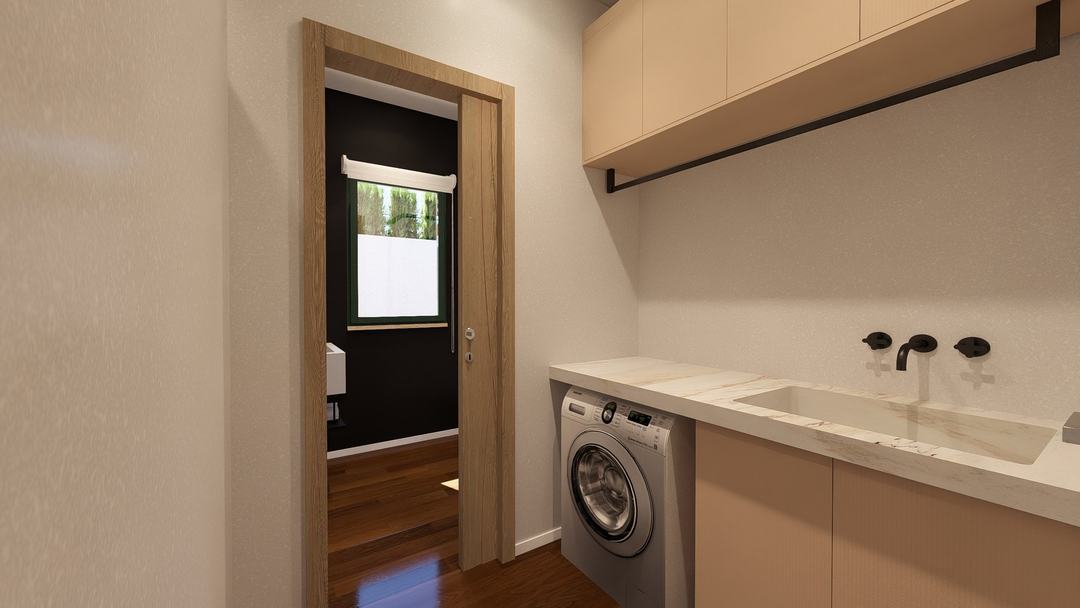 Laundry room of Villa HA with washing machine and fitted storage