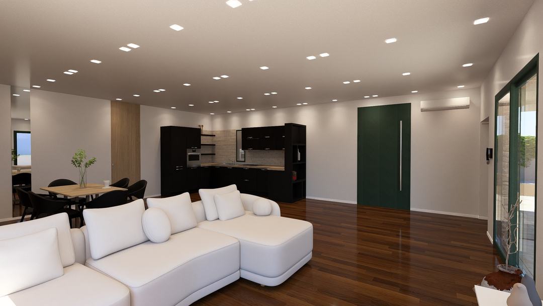 Open living and kitchen space of Villa HA with white sofa