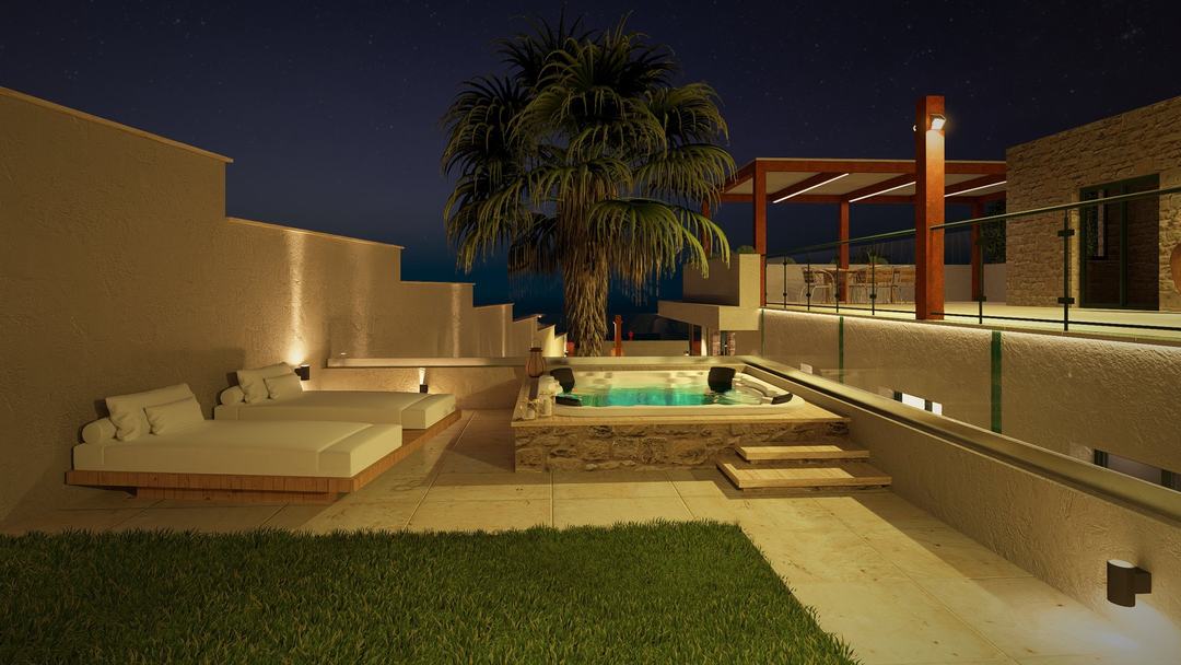 Villa HA jacuzzi and daybed area lit softly at night