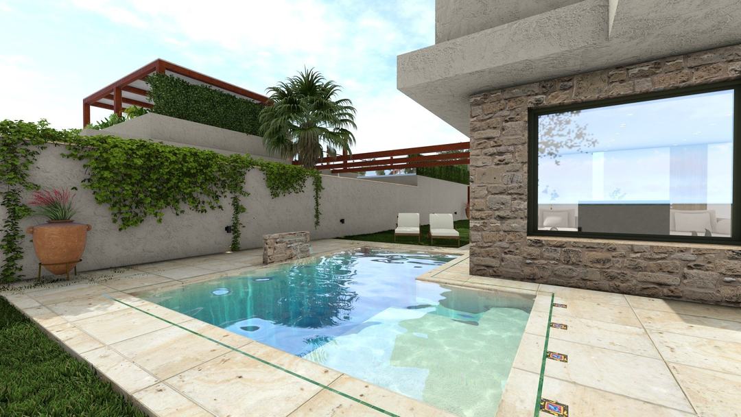 Villa HA pool framed by stone walls and the living room glazing